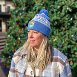 DENVER SUMMIT FC PRIMARY CREST BLUE POM BEANIE